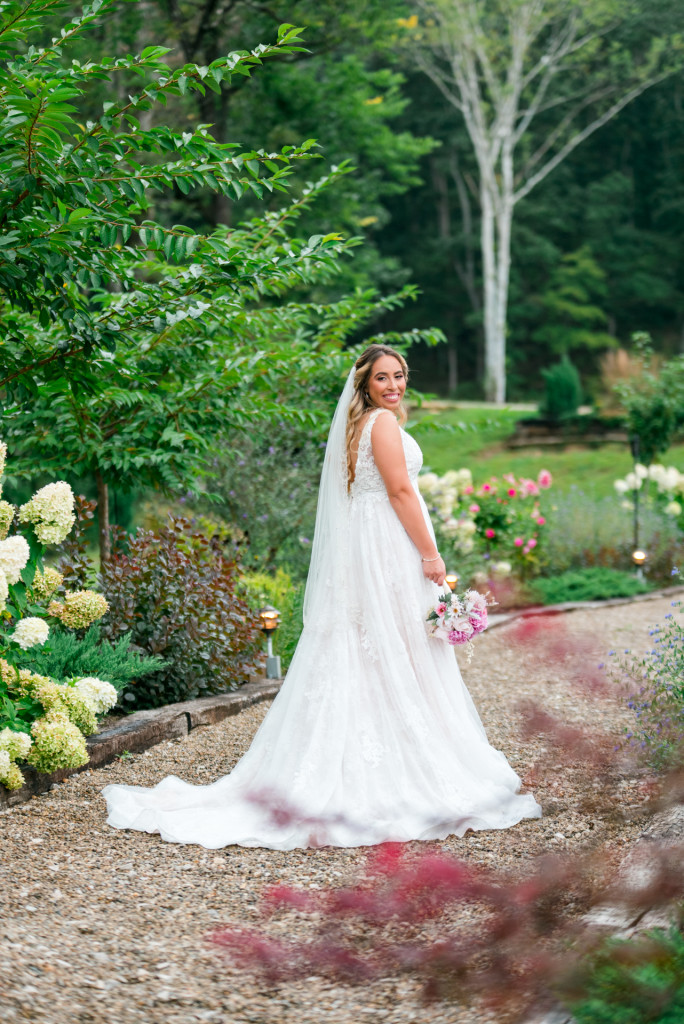 Bride on pathway at Valley Oaks Wedding Venue in Jeffersonville KY