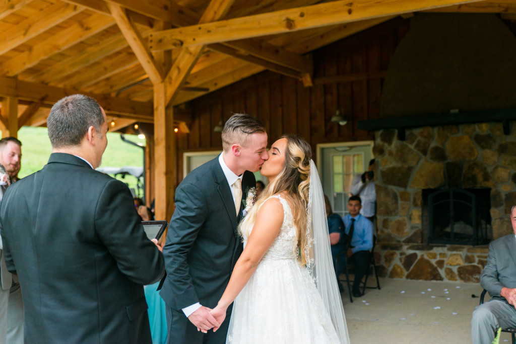 Bride and Groom kissing at Valley Oaks Wedding Venue in Jeffersonville Kentucky