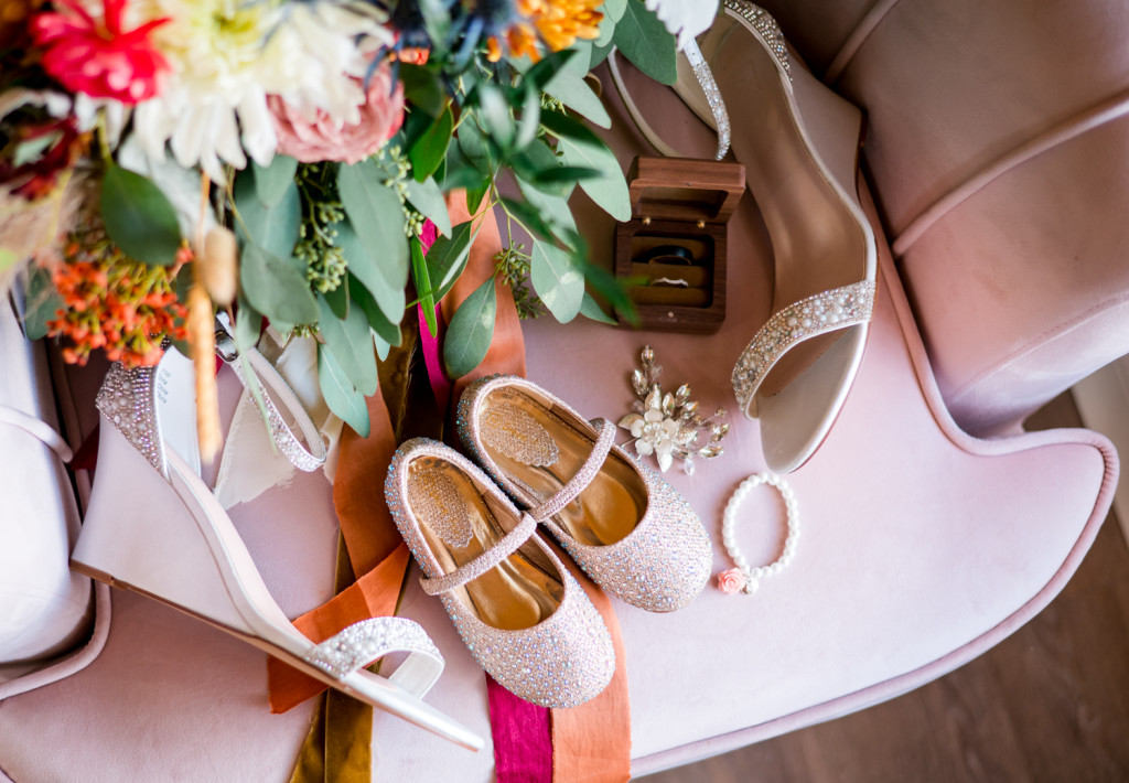 Bride's shoes in pink chair at Meadowview Wedding Venue