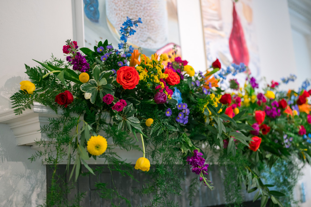 bright, colorful flowers on mantle