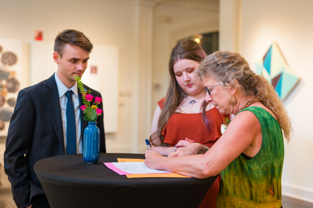 witness signing wedding certificate