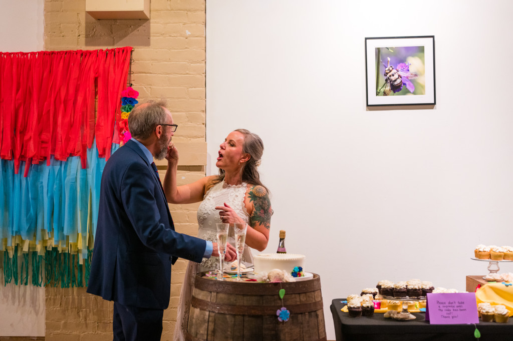 bride and groom eating cake